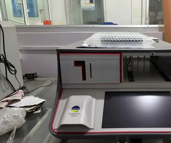 A molecular diagnostics analyser on the laboratory bench.